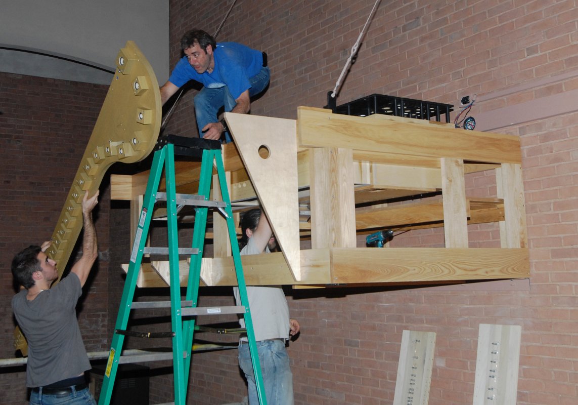 DSC_4708.JPG - Installing the pipe support for the facade pipes on the west antiphonal.