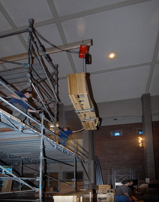 DSC_5038.JPG - Hositing one of the wind chests up to the scaffolding.